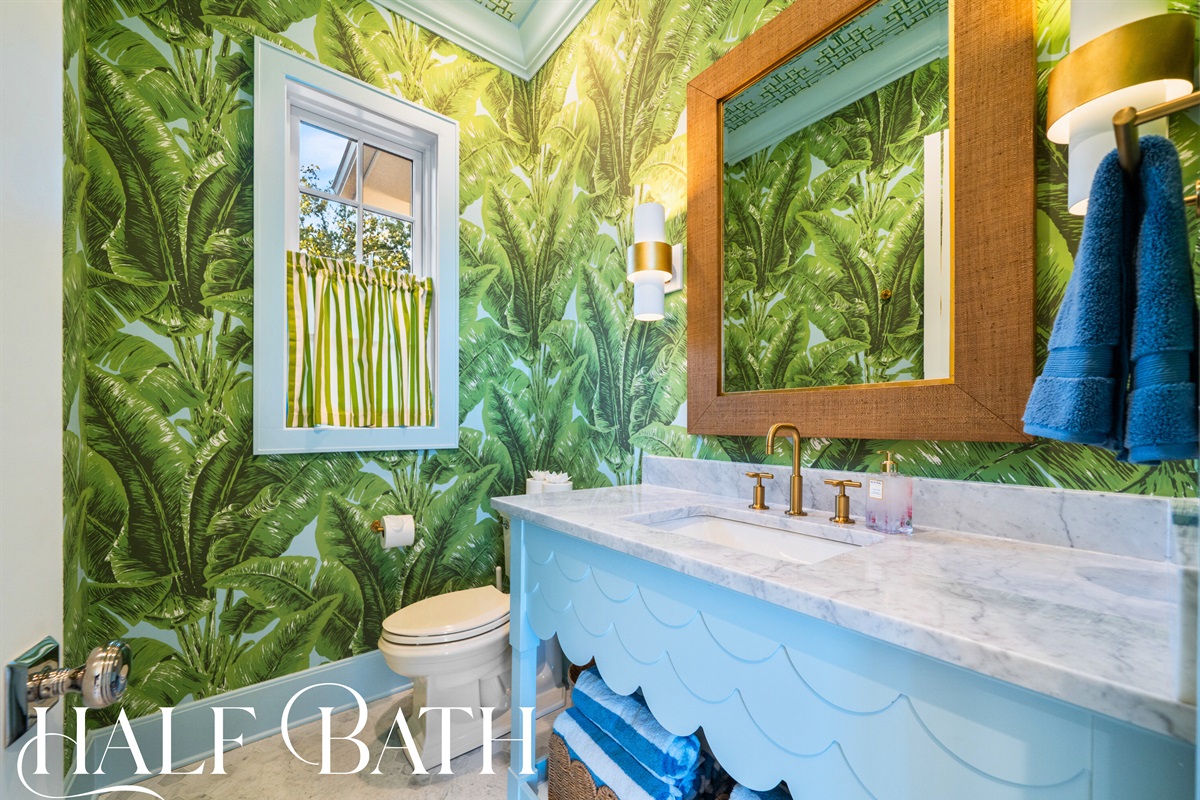 Tropical inspired half bath.