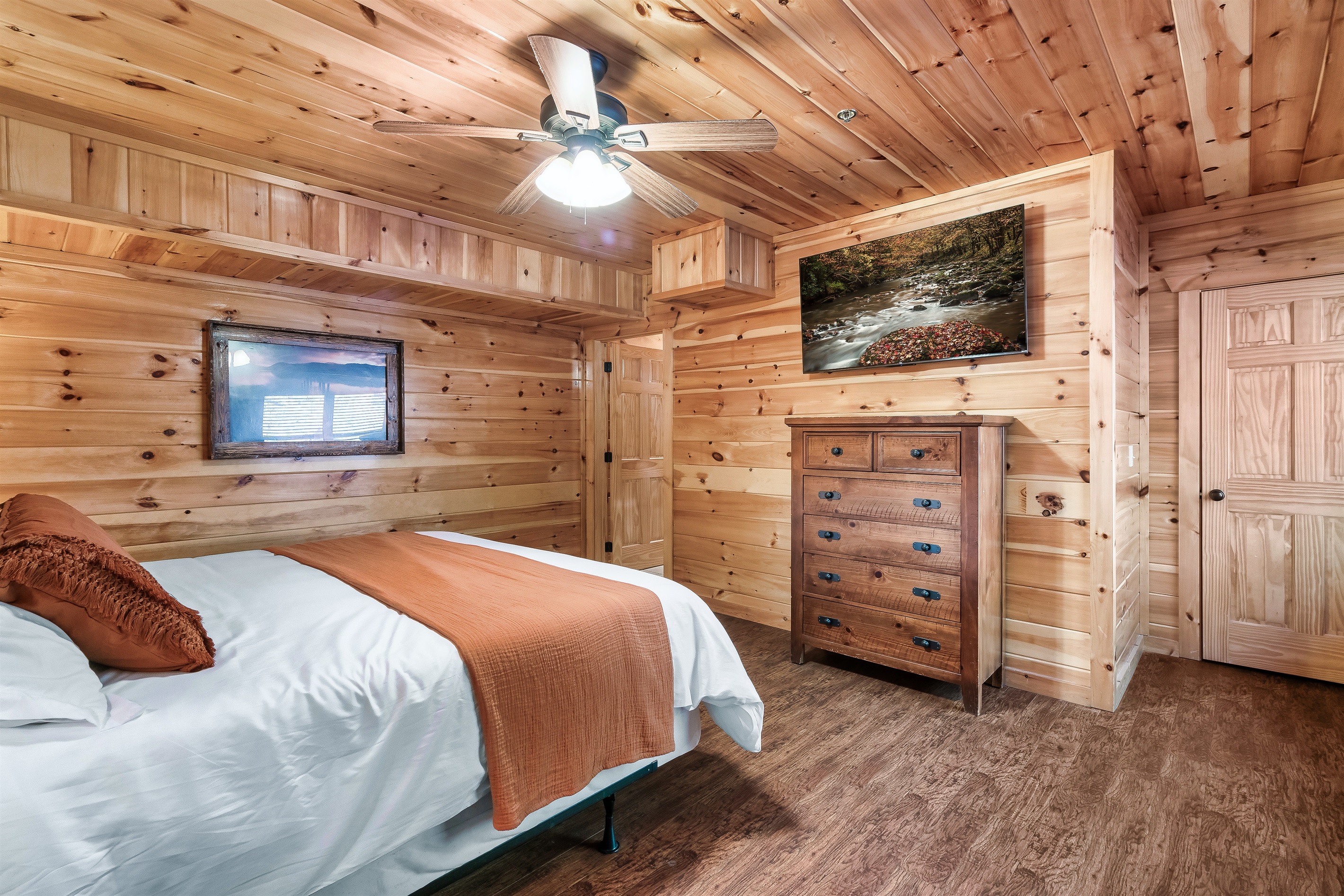Relax into a warm, inviting bedroom that feels calm, comfortable, and perfect after a full mountain day.