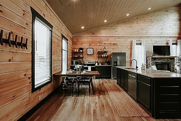 Cook together in a fully equipped kitchen that blends rustic charm with modern convenience