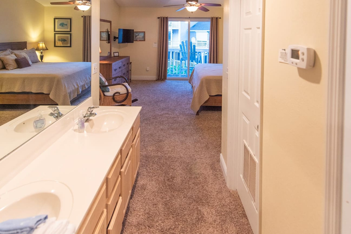 Share the king ensuite without the morning standoff &mdash; double sinks mean everyone gets ready without waiting.