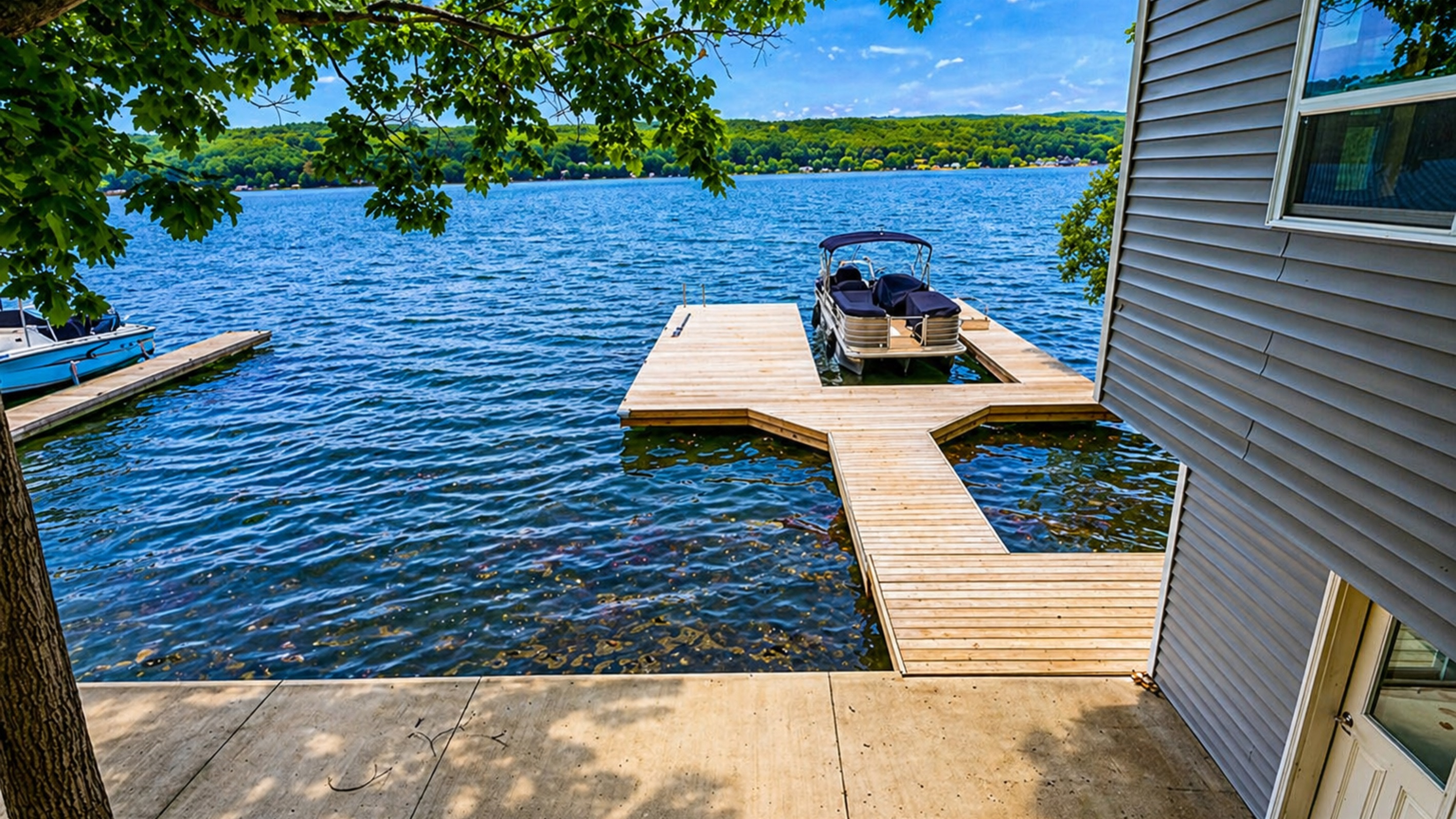 Private dock offers direct lake access and stunning water views—perfect for swimming, boating, or soaking in serene Finger Lakes sunsets. 🌅🚤🌿