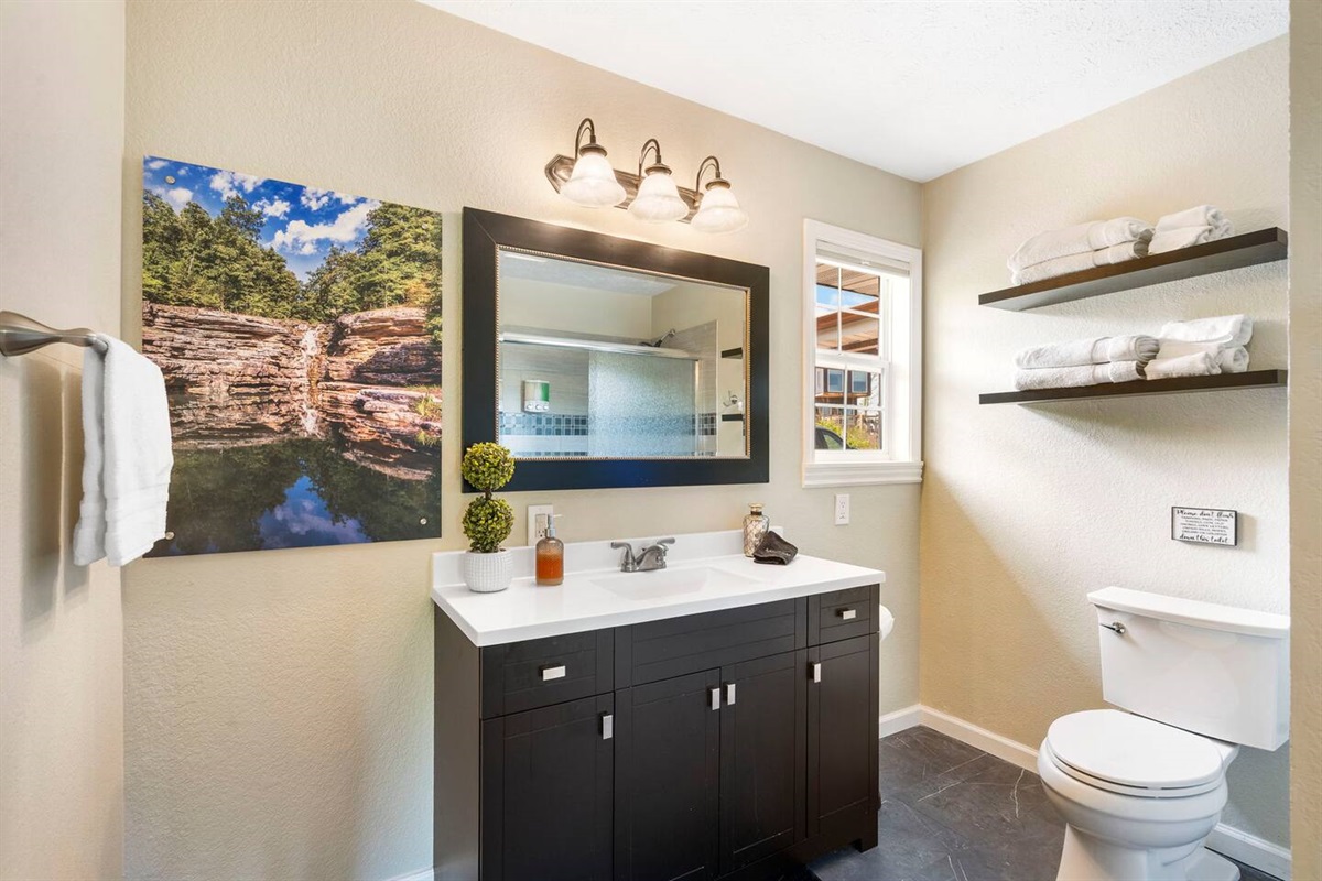 Private ensuite bath - modern, spotless, and fully stocked for guests.