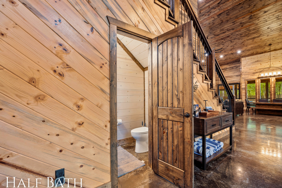 A convenient half bath located off the living room