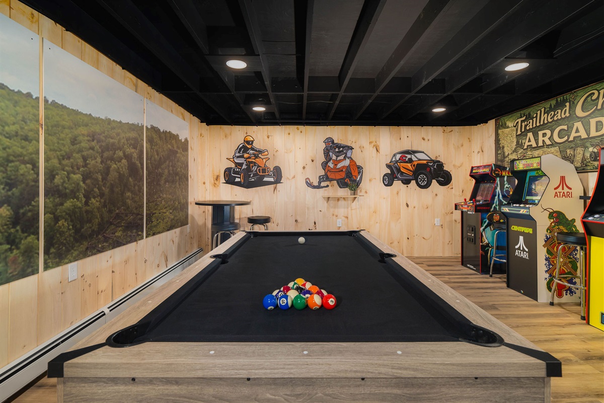 🎱 Rack 'em up — full pool table in the heart of the game room.