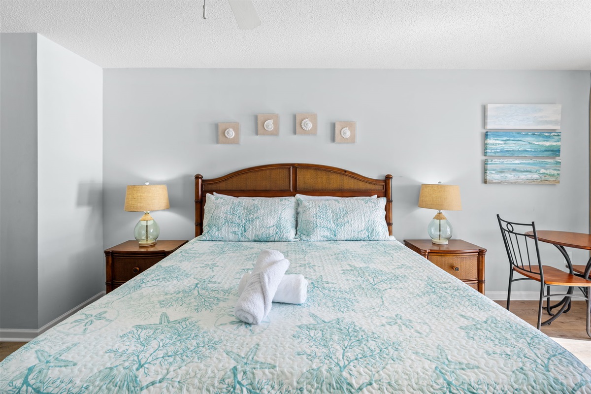 Oceanfront Main Bedroom with king bed and balcony access