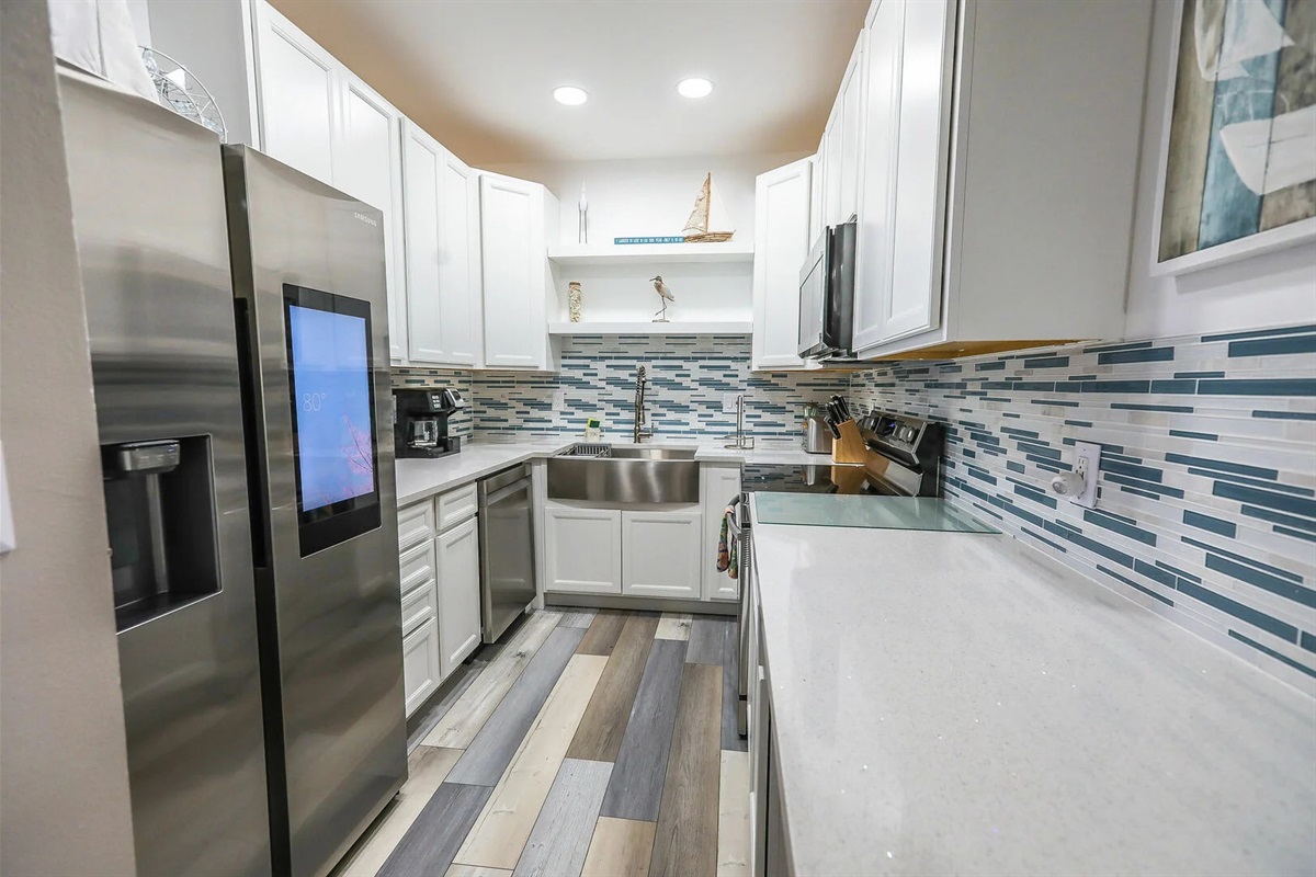 Modern kitchen with clean lines and coastal-inspired finishes.