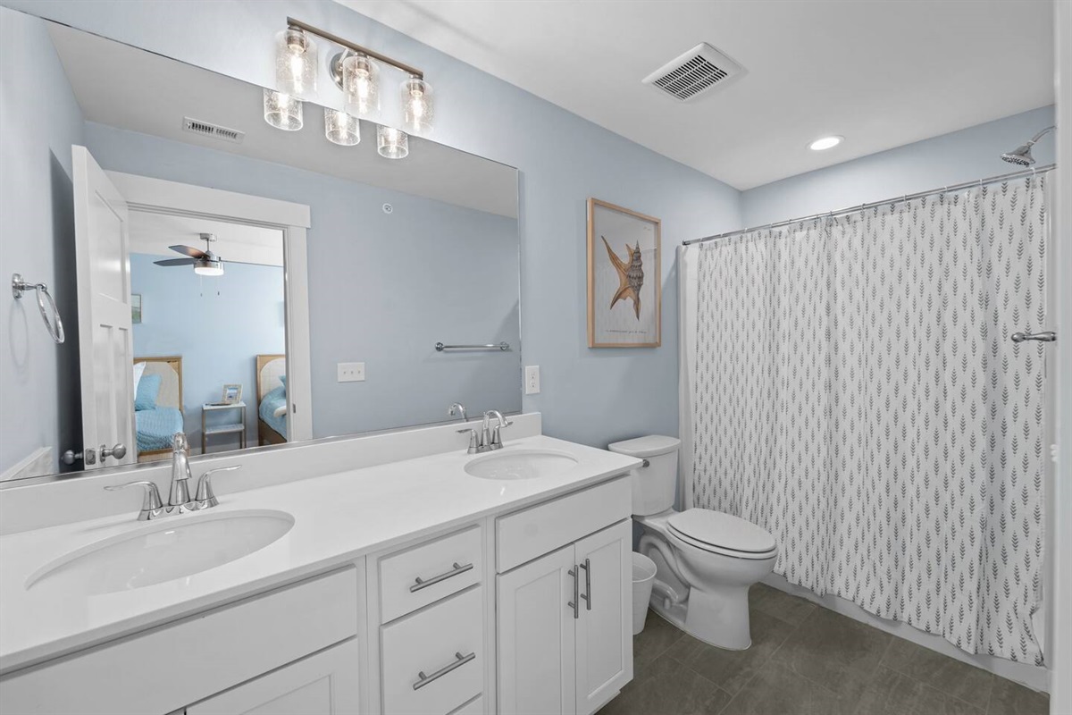 4th Floor Ensuite bath with double vanity and shower
