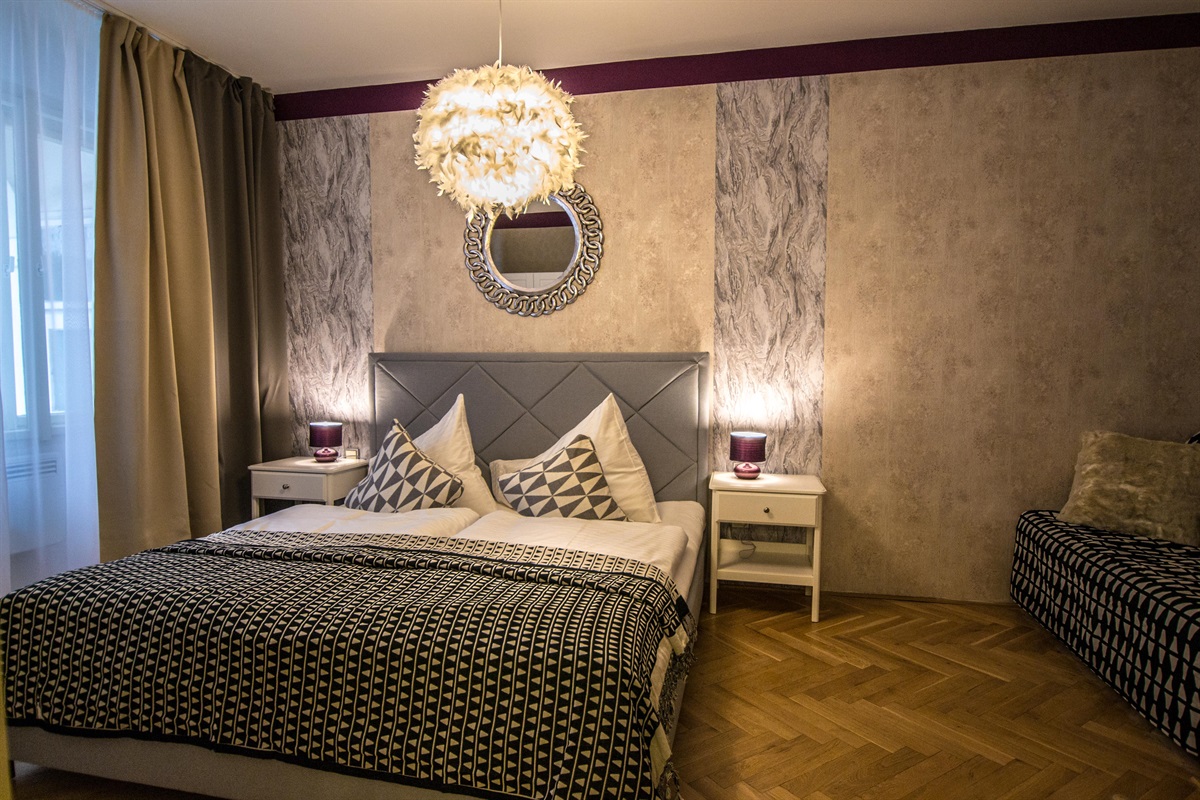 2nd bedroom with a big queen bed and convertible sofa, if you need addtional sleeping space for 2 people