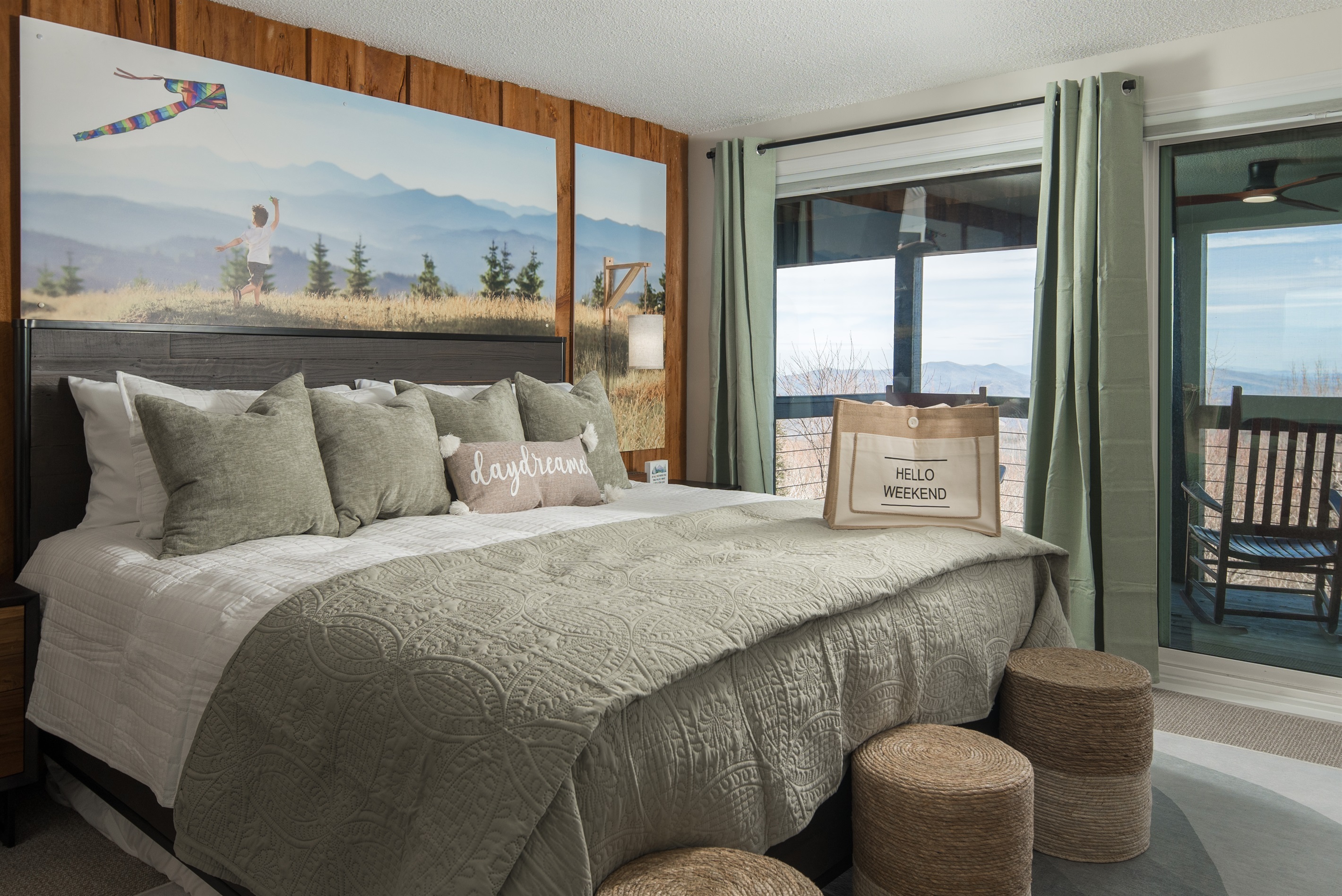 Summer Kites Bedroom:  Relax with breathtaking views, a luxury king bed, 55' Roku TV, a work desk, a access to the lower deck.  A perfect balance of comfort and functionality.
