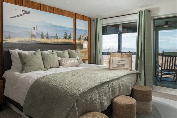 Summer Kites Bedroom:  Relax with breathtaking views, a luxury king bed, 55' Roku TV, a work desk, a access to the lower deck.  A perfect balance of comfort and functionality.