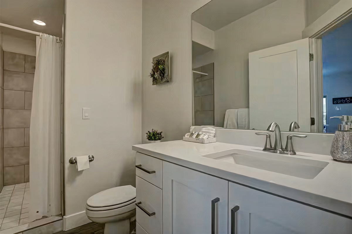 Full bathroom on main level with large walk-in shower.