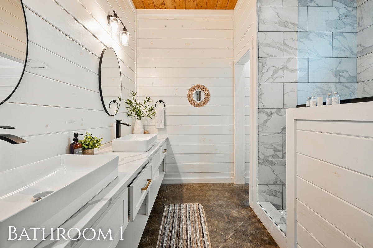 Experience modern elegance in this well-appointed bathroom. It's the refresh you'll crave on your vacation escape!