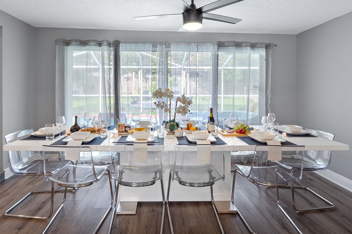 Enjoy scenic views of the pool area while dining, thanks to the room’s large windows and open-plan feel.