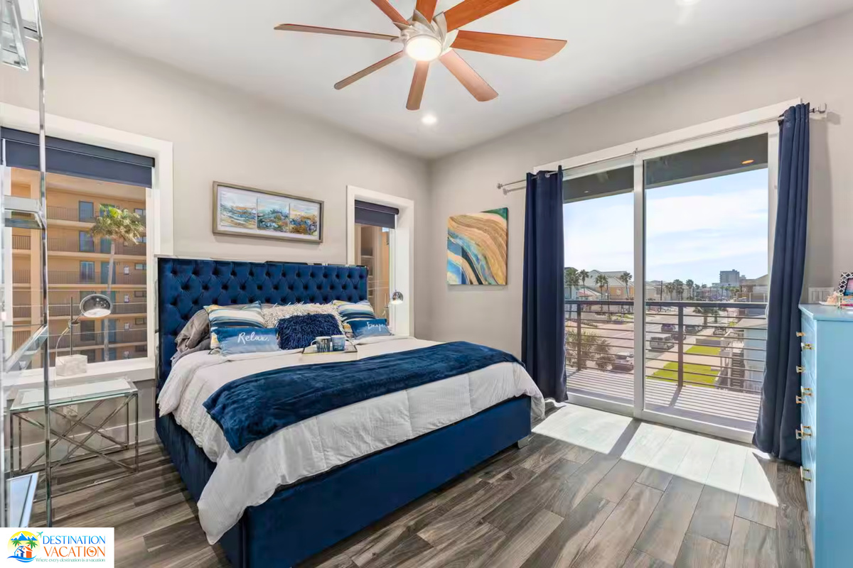 Wake up to stunning views from this serene bedroom.