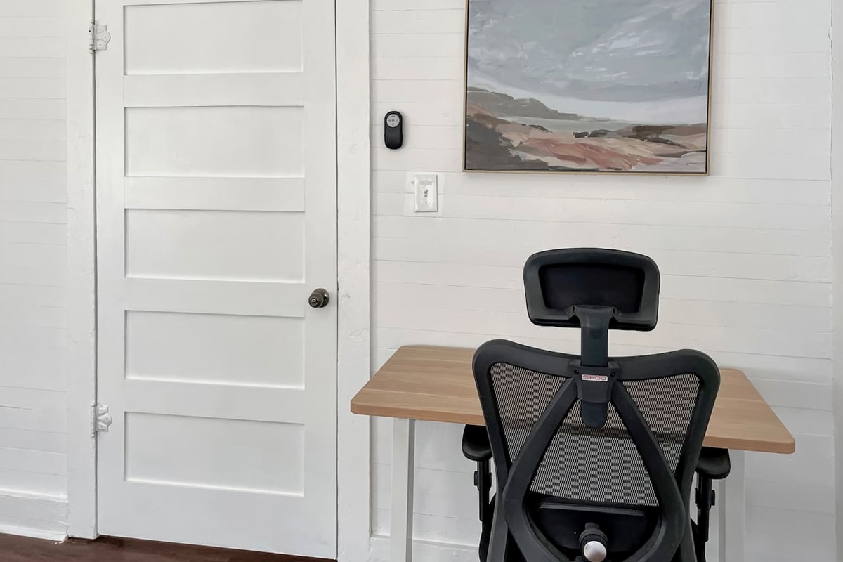 The large desk and ergonomic chair will help you stay focused.