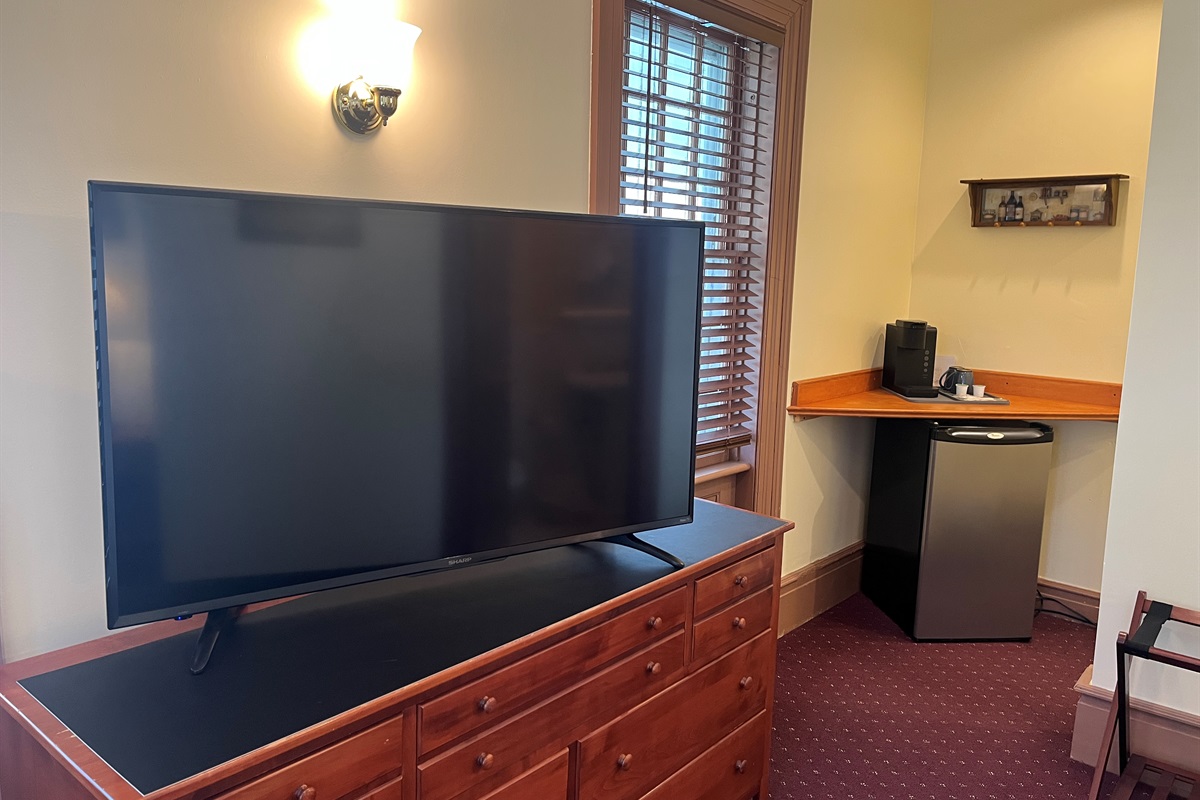 Guest room #3 sitting area and mini fridge