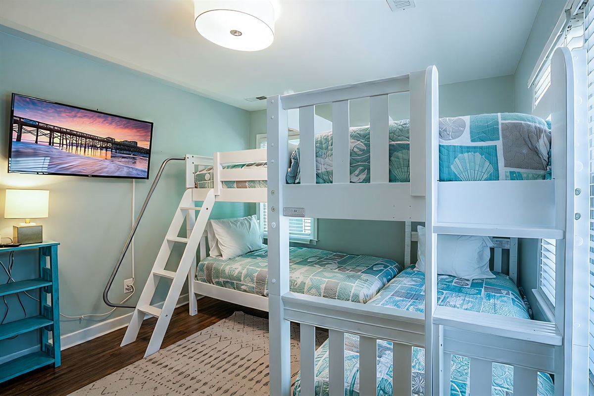 Bunk Bedroom 4 has a set of two bunk beds for a fun kid's bedroom!  Updated beach bedding for a fun retreat! | IOP Escapes Beach Blessing | 3705 Hartnett Blvd, Isle of Palms, SC