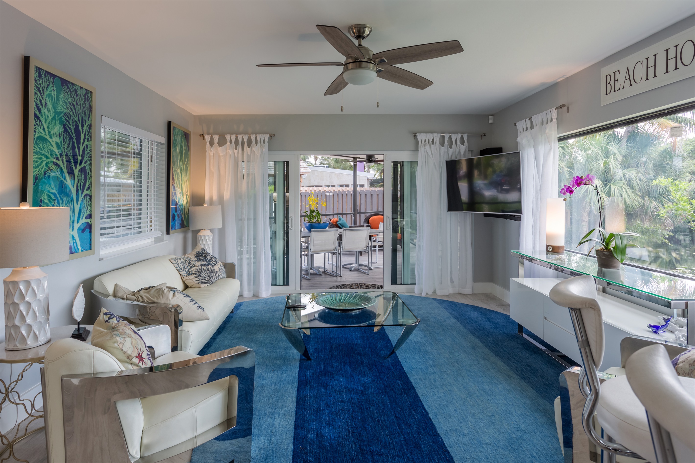 Relax in Style while looking at Long Lake — Comfortable Seating, Big TV & Scenic Views