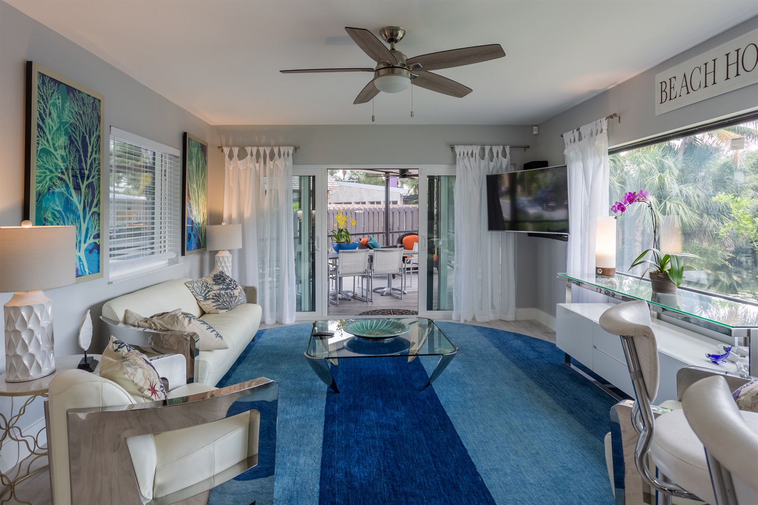 Relax in Style while looking at Long Lake — Comfortable Seating, Big TV & Scenic Views