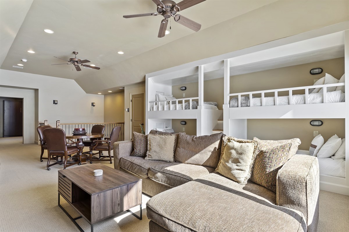 A second living area with plenty of seating—ideal for spreading out, watching movies, or giving everyone their own space.