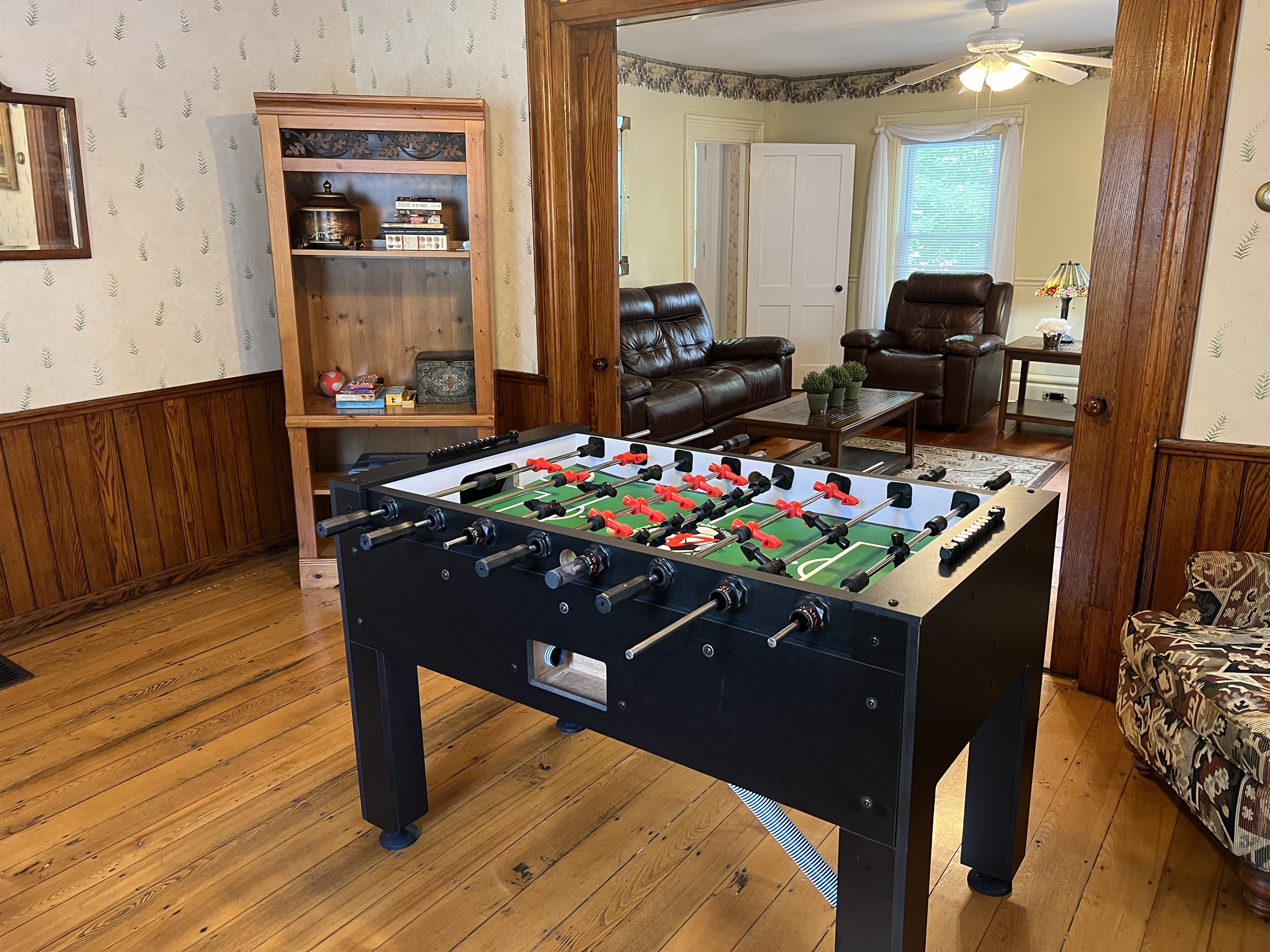 The Federal House game room with foosball and pick up games.