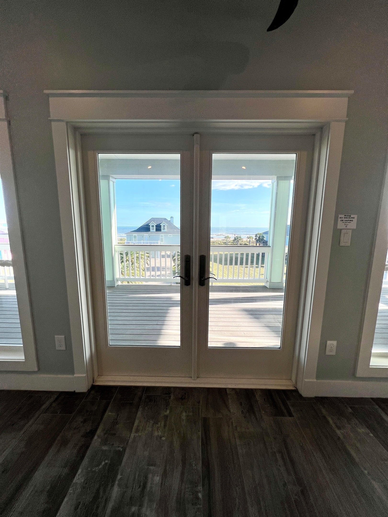 Crystal Paradise Living Room: Enjoy a view to die for, whether you’re sipping coffee in the morning or relaxing at sunset.