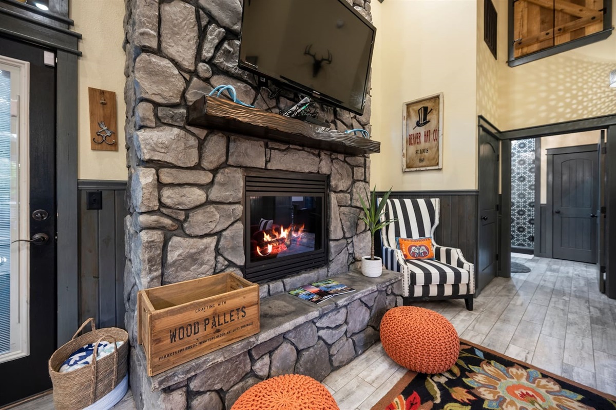 Enjoy the glow and crackle of the gas fireplace from the comfort of the plush seating area.
