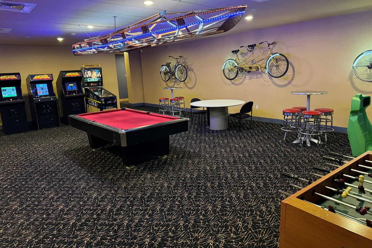 Game room with pool, foosball, arcade games, and a golf simulator!   Enjoy some quality time with your friends and family!