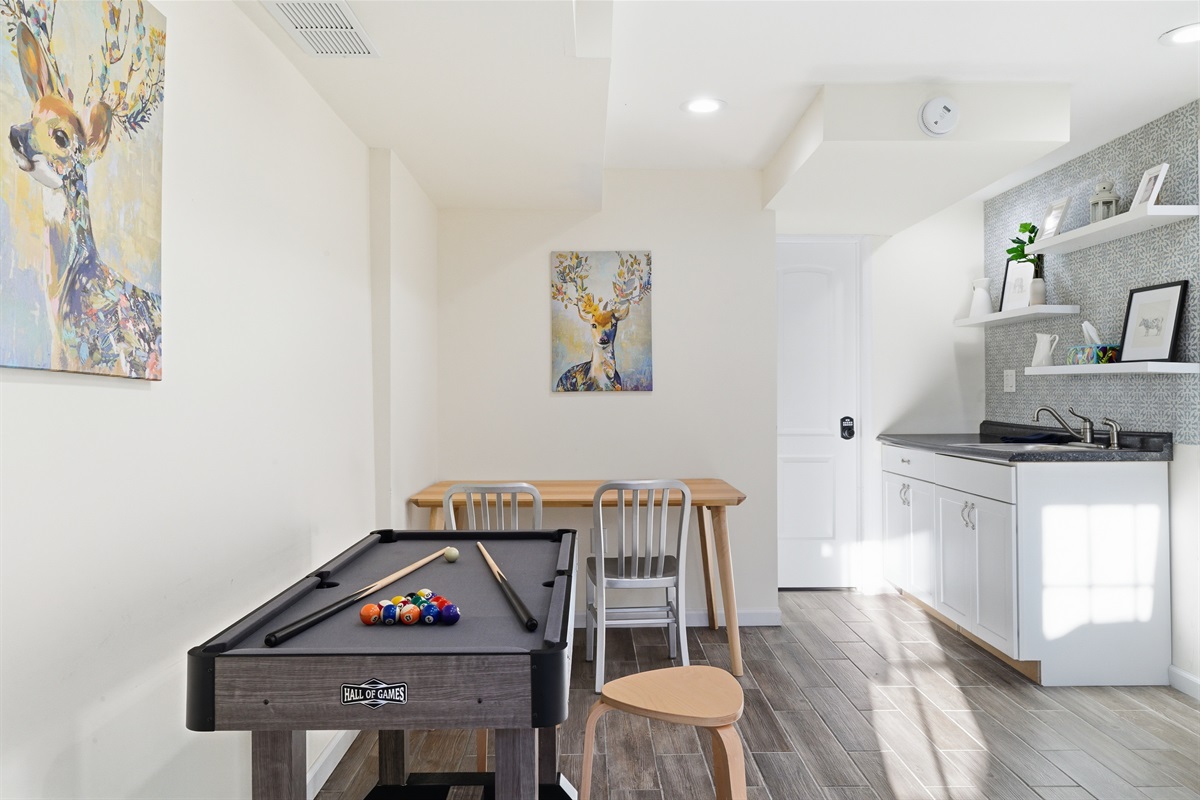 Lower level with Smart TV, PlayStation 5, foosball, mini pool table