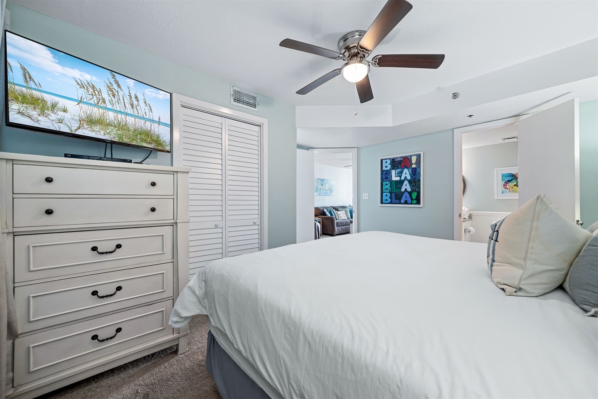 The Primary King Bedroom offers plush bedding, charming nautical accents, and all the quiet comfort you need for a truly rejuvenating vacation.