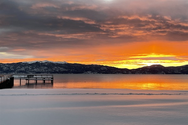 View of Lake Tahoe and our pier at sunrise in February