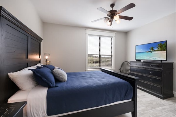 Welcoming private bedroom with a comfortable queen bed, fresh linens, bedside lighting, and thoughtful touches to help guests feel settled and at home during their Lake Travis stay