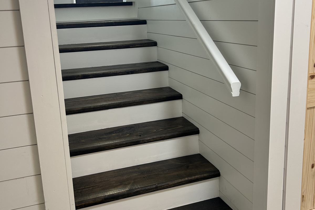 Steps to 1st floor from ground level, also there is a separate entrance from garage and bottom East side of house