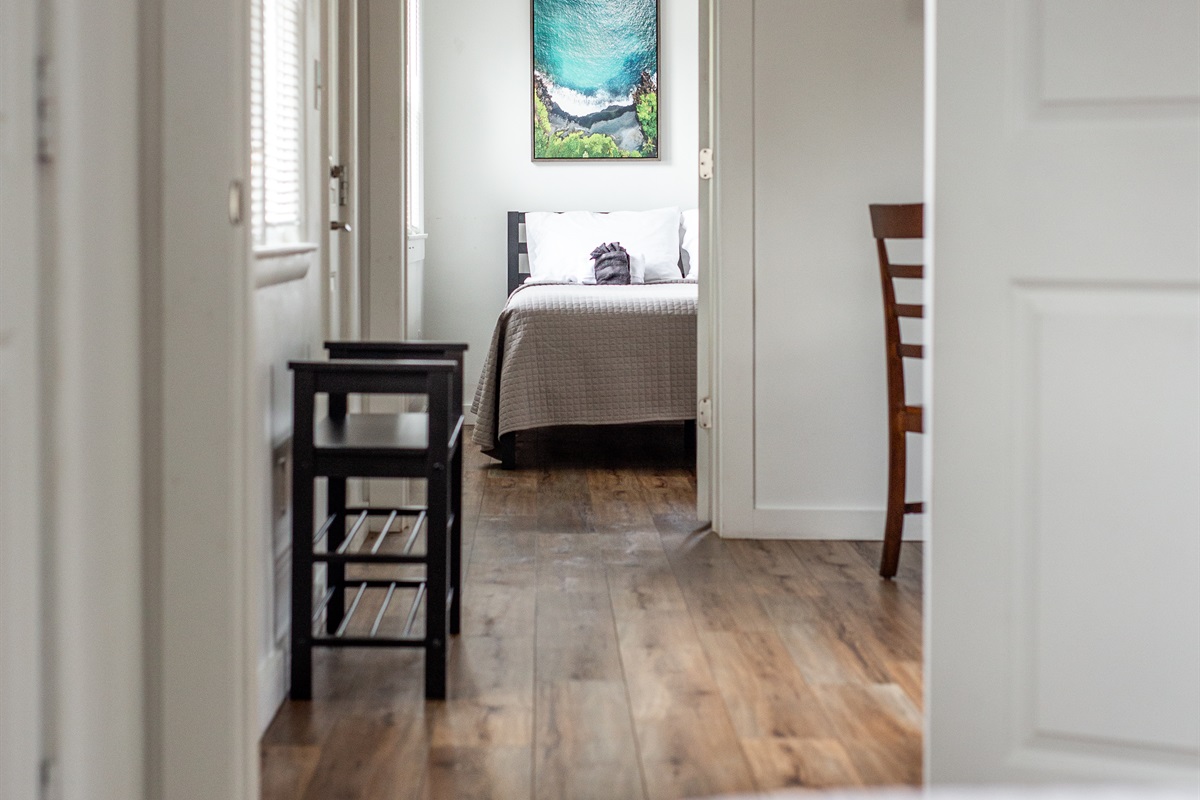 Entry to bedroom to the left