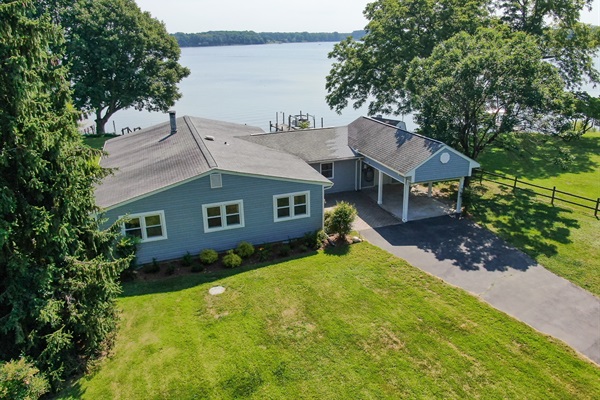Gorgeous wide-open water views and single floor living where you can breathe out in the country.