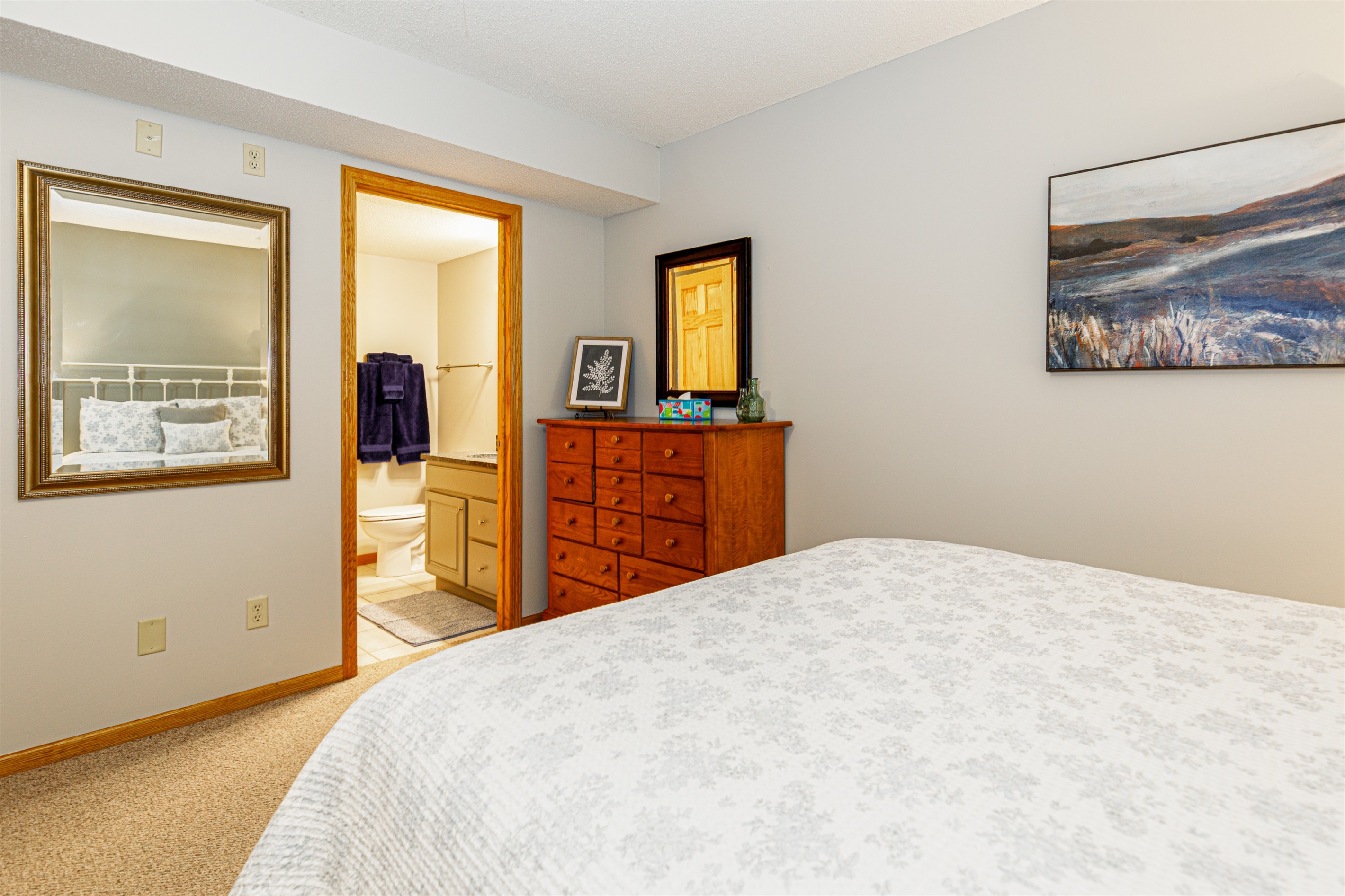 Bedroom #3 features two queen beds and an ensuite bathroom