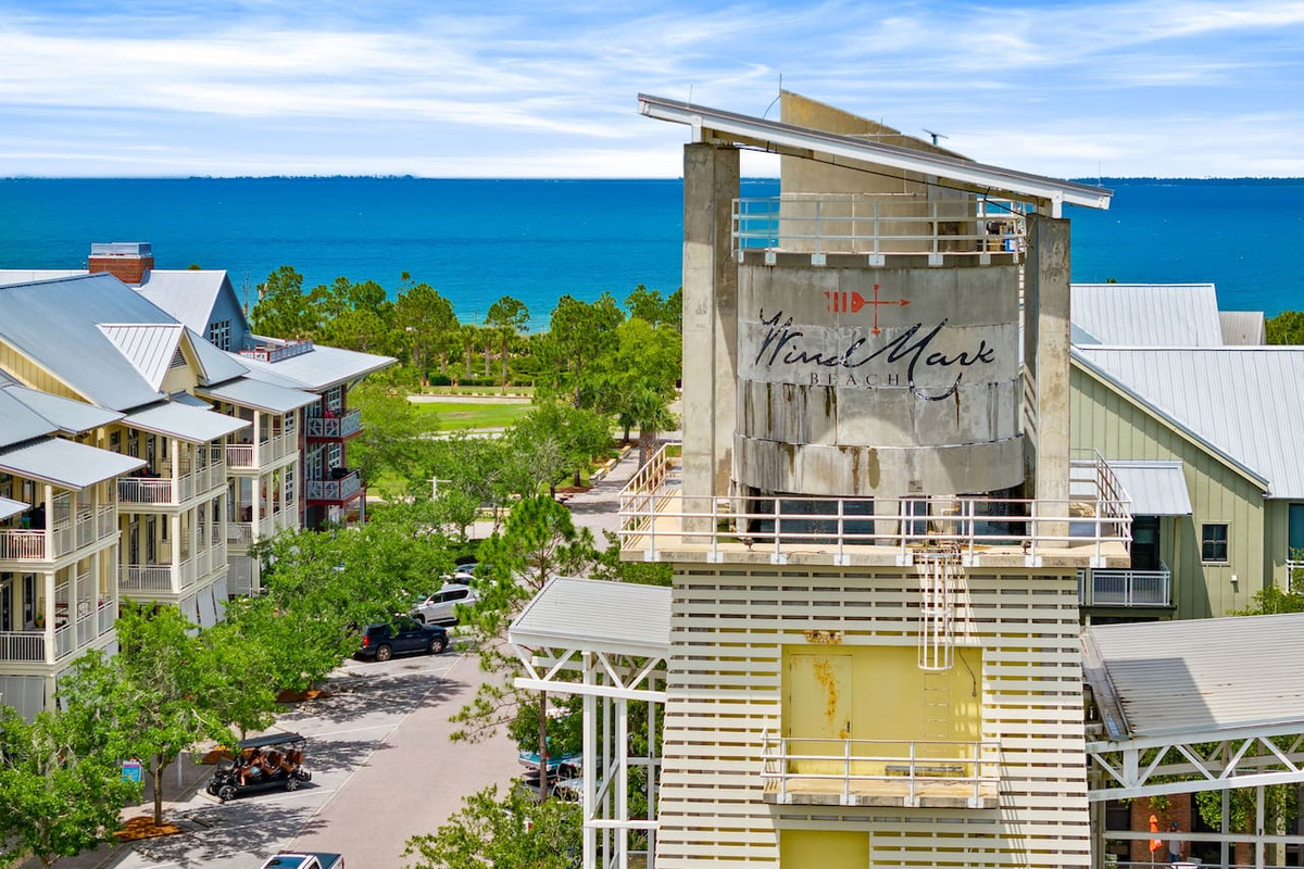 Community Town Center with dining, beach access, community pool, live entertainment, cafe, and candy shop | 6 min walk from home
