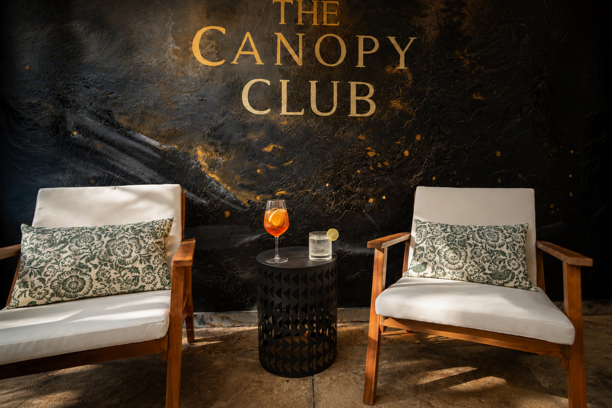 {Pool Lounge} Settle in beneath the Canopy Club mural with a drink in hand—the perfect spot to unwind between swims, hot tub soaks, and mountain adventures.
