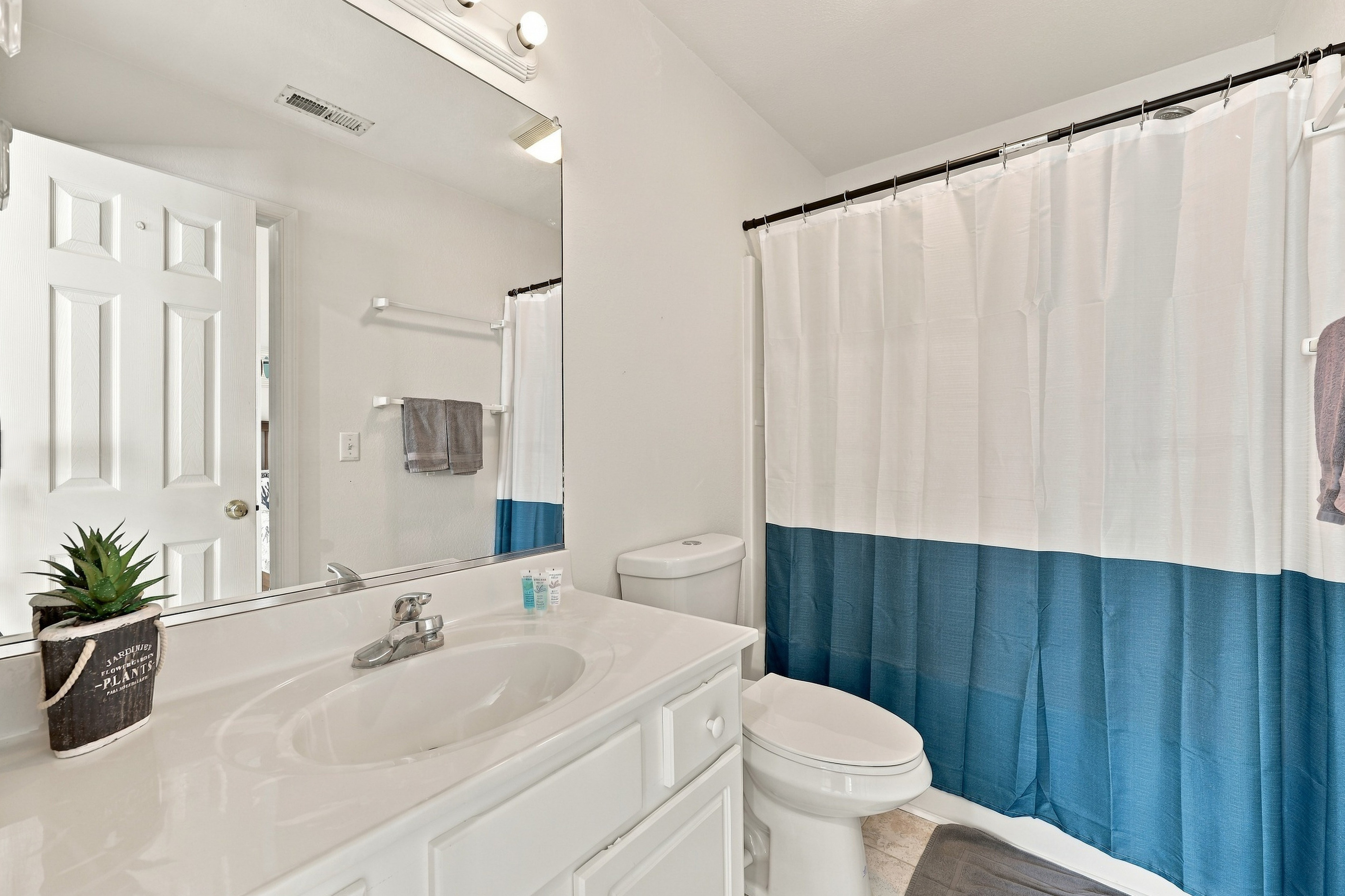 Top-floor full bath, just steps from the bedroom and living area.