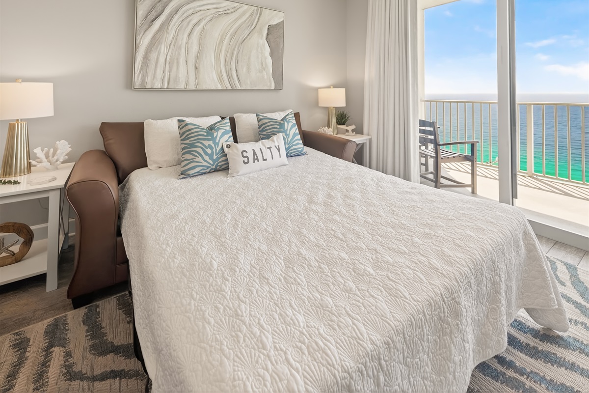 Sofa bed in living area, comfort meets the coast