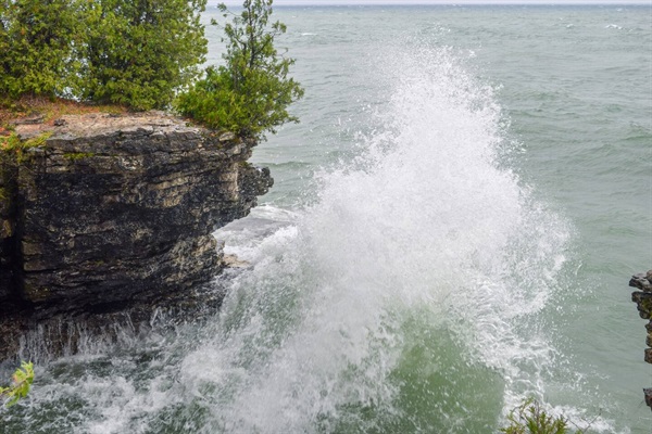 Not an uncommon site at Cave Point Park, just down the road, about 9 min. walk, from our home.