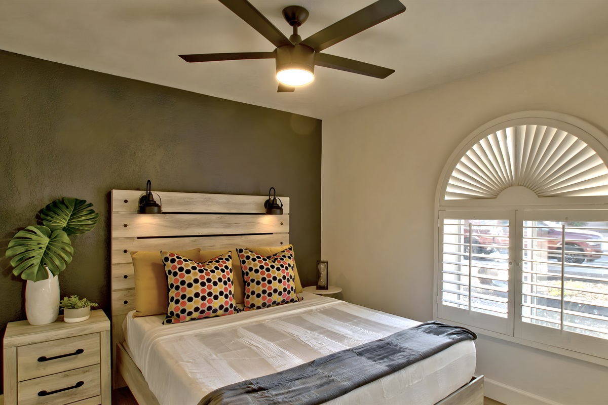 3rd Bedroom: Queen bed with two nightstands and industrial-style lamps