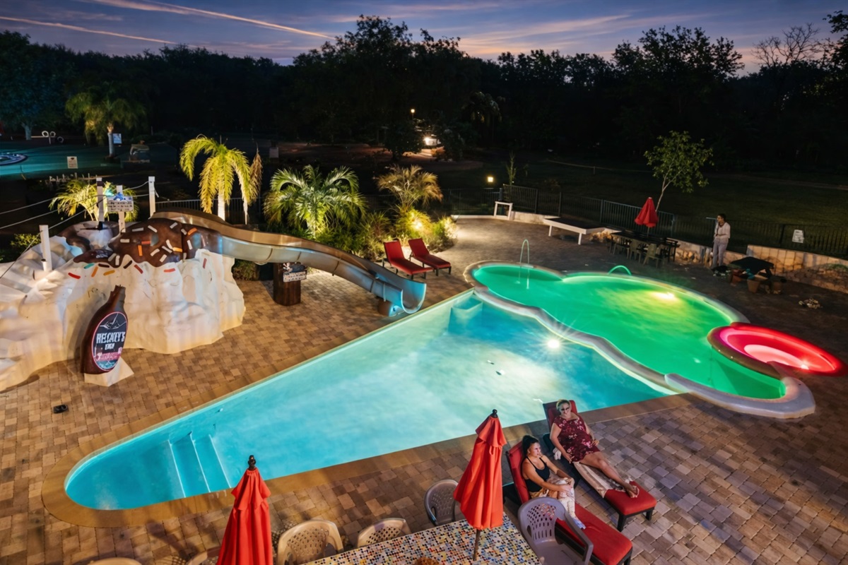 Tropical pool paradise at dusk