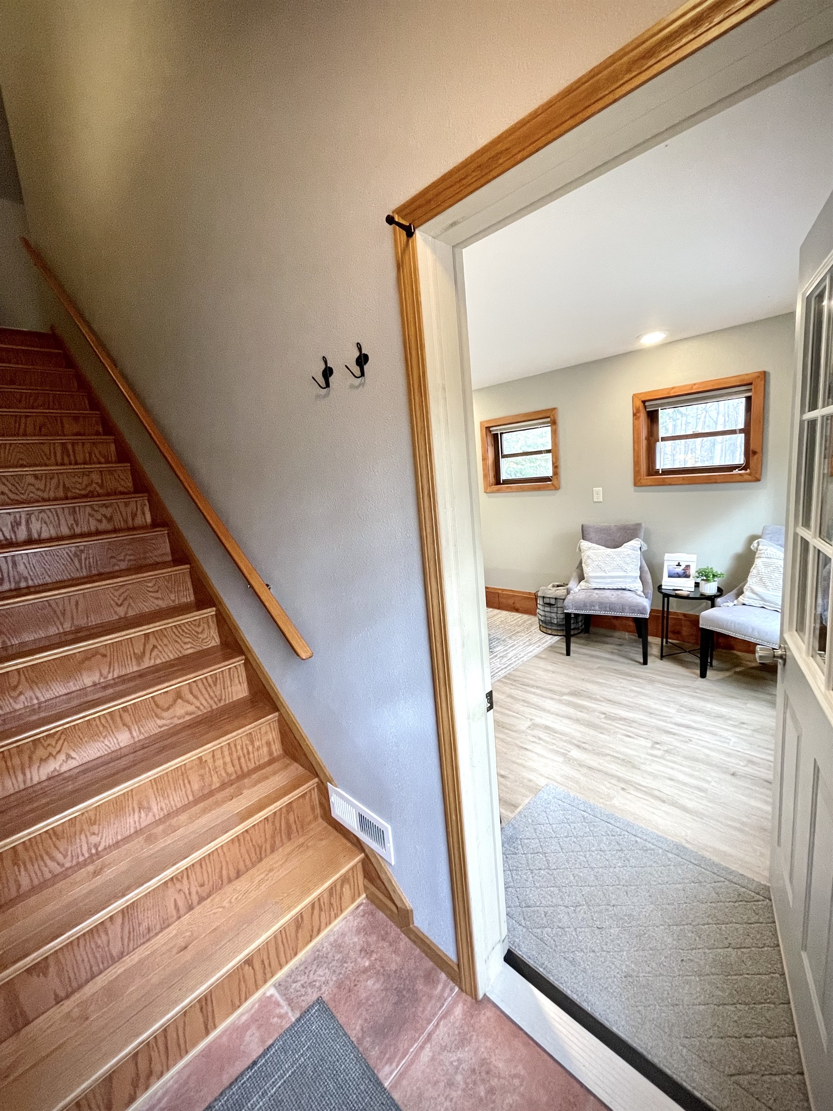 stairs to second level    *note bedroom is on the main lower entry level must take stairs to access upper loft kitchen living bathroom* 