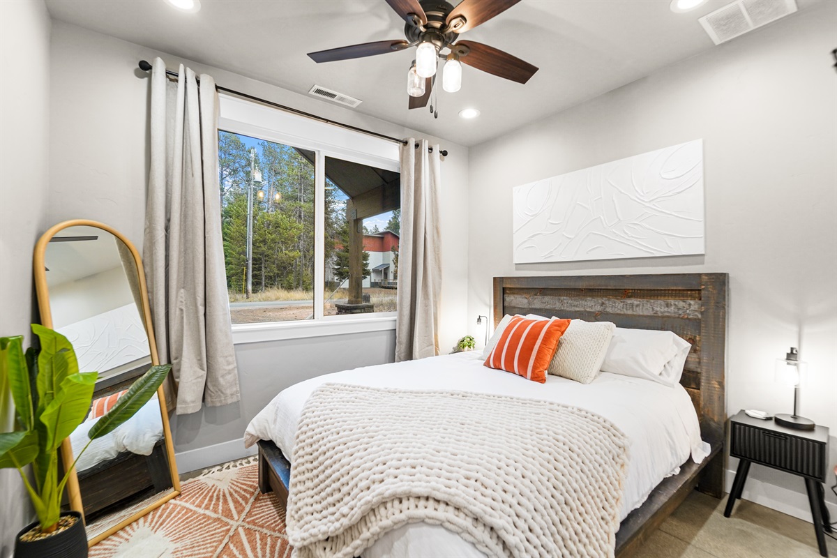 Bright windows and tasteful art complete this relaxing retreat space.