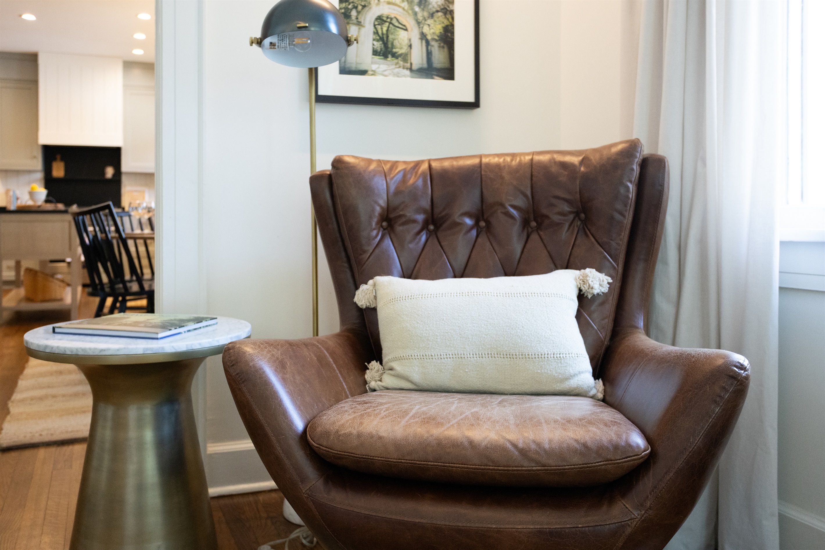 A rich leather chair adds a touch of timeless style—perfect for reading, relaxing, or enjoying your morning coffee.