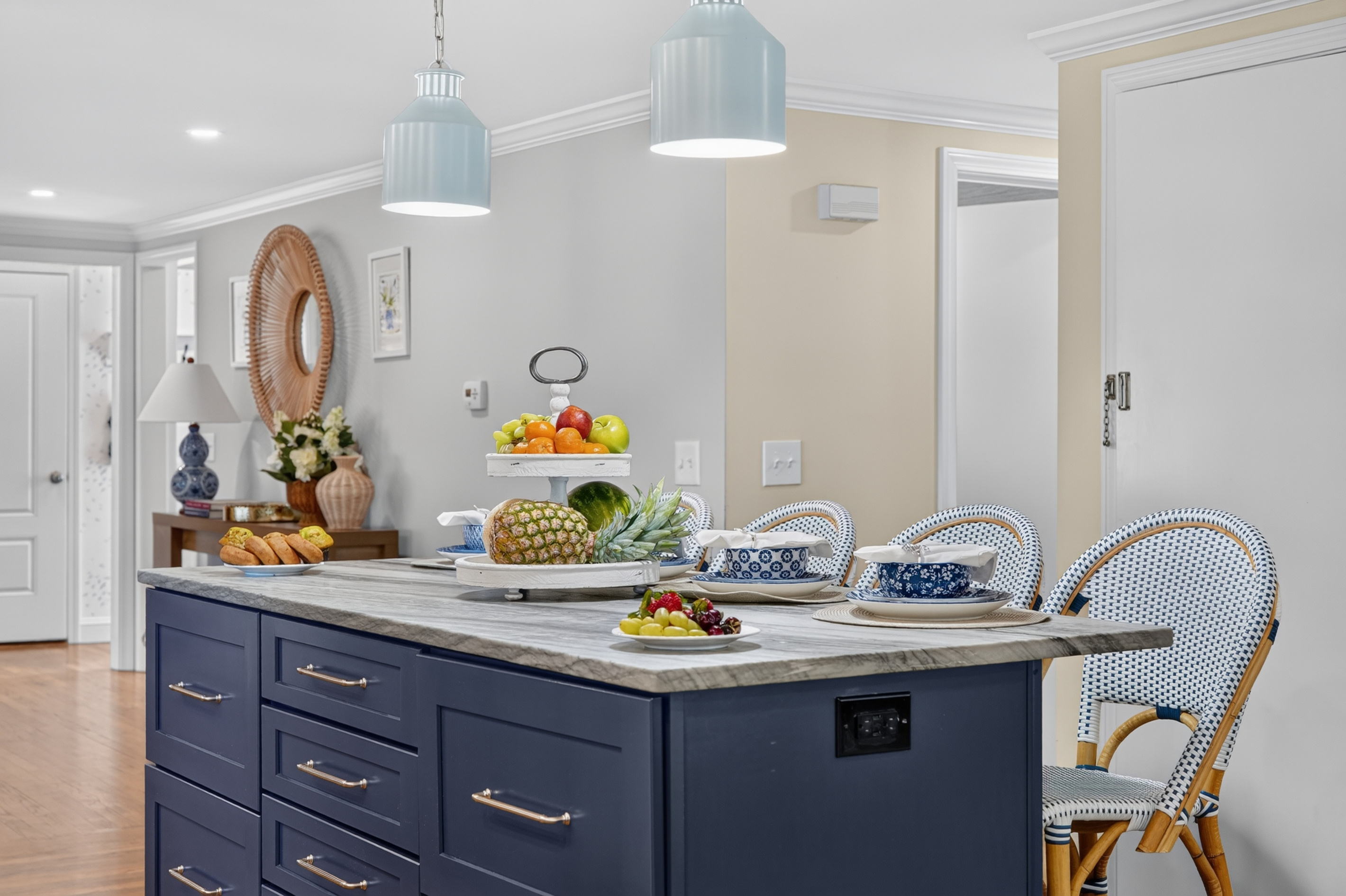 Wide view of the open-concept kitchen designed for entertaining.