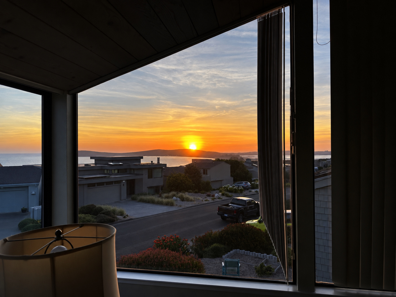Sunset views from upstairs living room windows...Guests get the BEST shots!