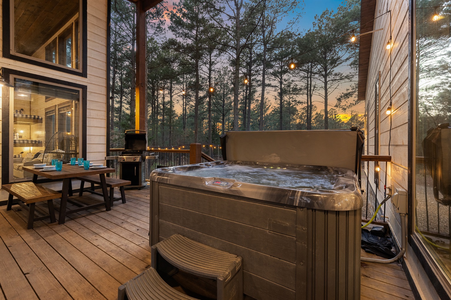 Lounge by the fire, soak in the hot tub, and take in peaceful forest views at Piece of the Moon.