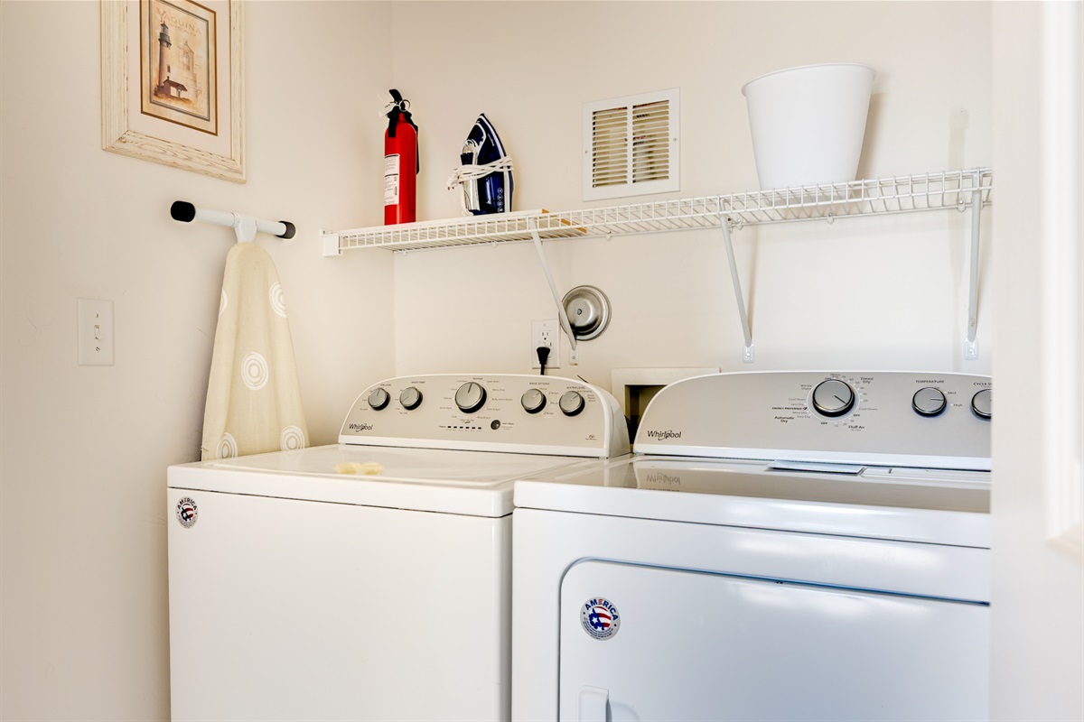 Convenient laundry area with full-size washer and dryer, ideal for longer stays, beach towels, and everyday comfort